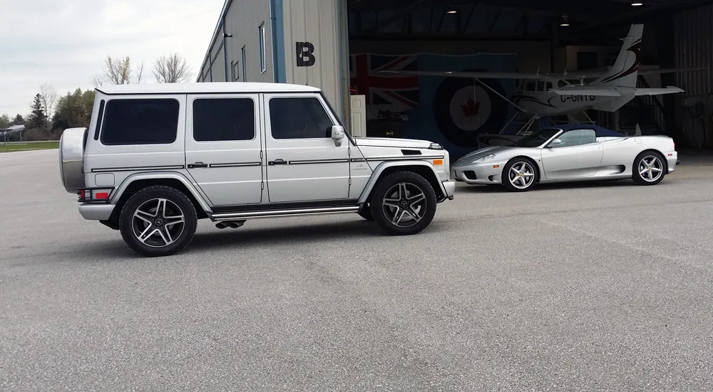 Ferrari and Mercedes G Wagon